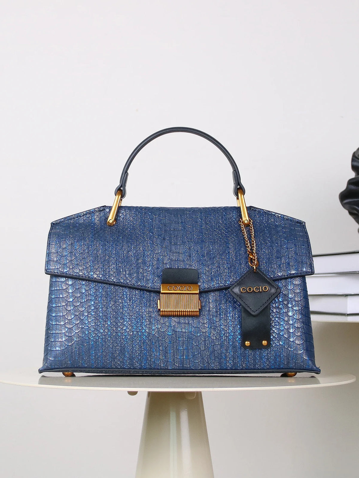 Textured Leather Shoulder Bag with Gold Hardware and Detachable Charm