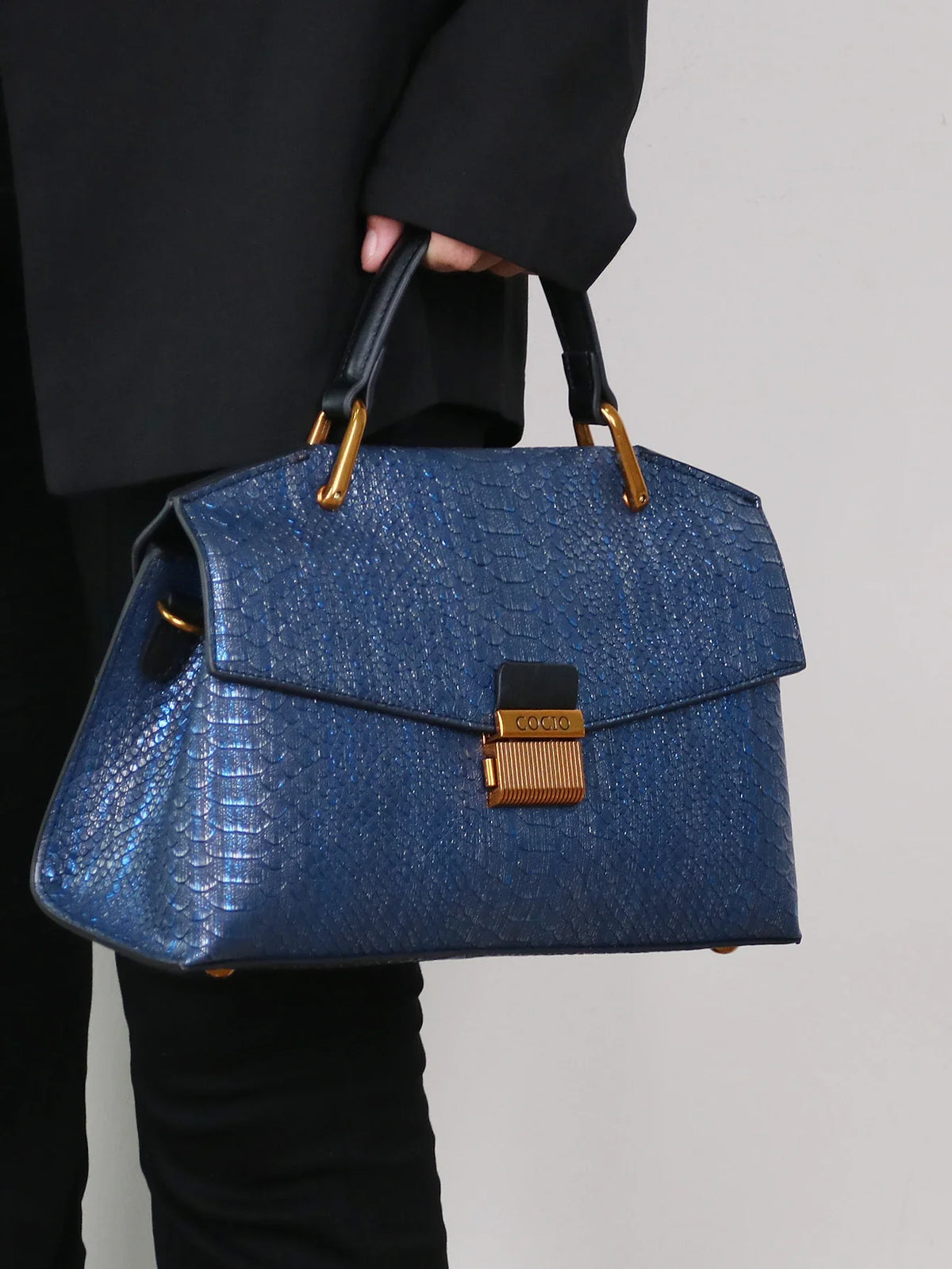 Textured Leather Shoulder Bag with Gold Hardware and Detachable Charm