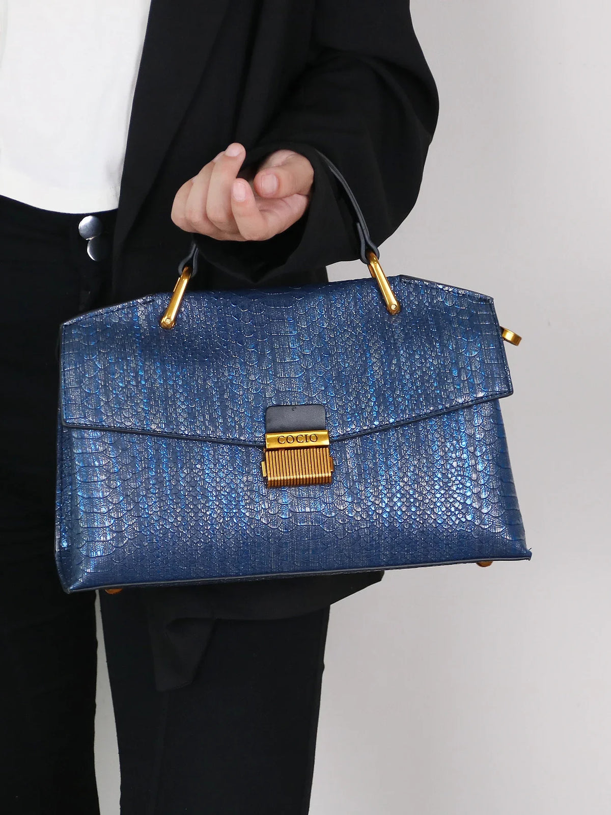 Textured Leather Shoulder Bag with Gold Hardware and Detachable Charm