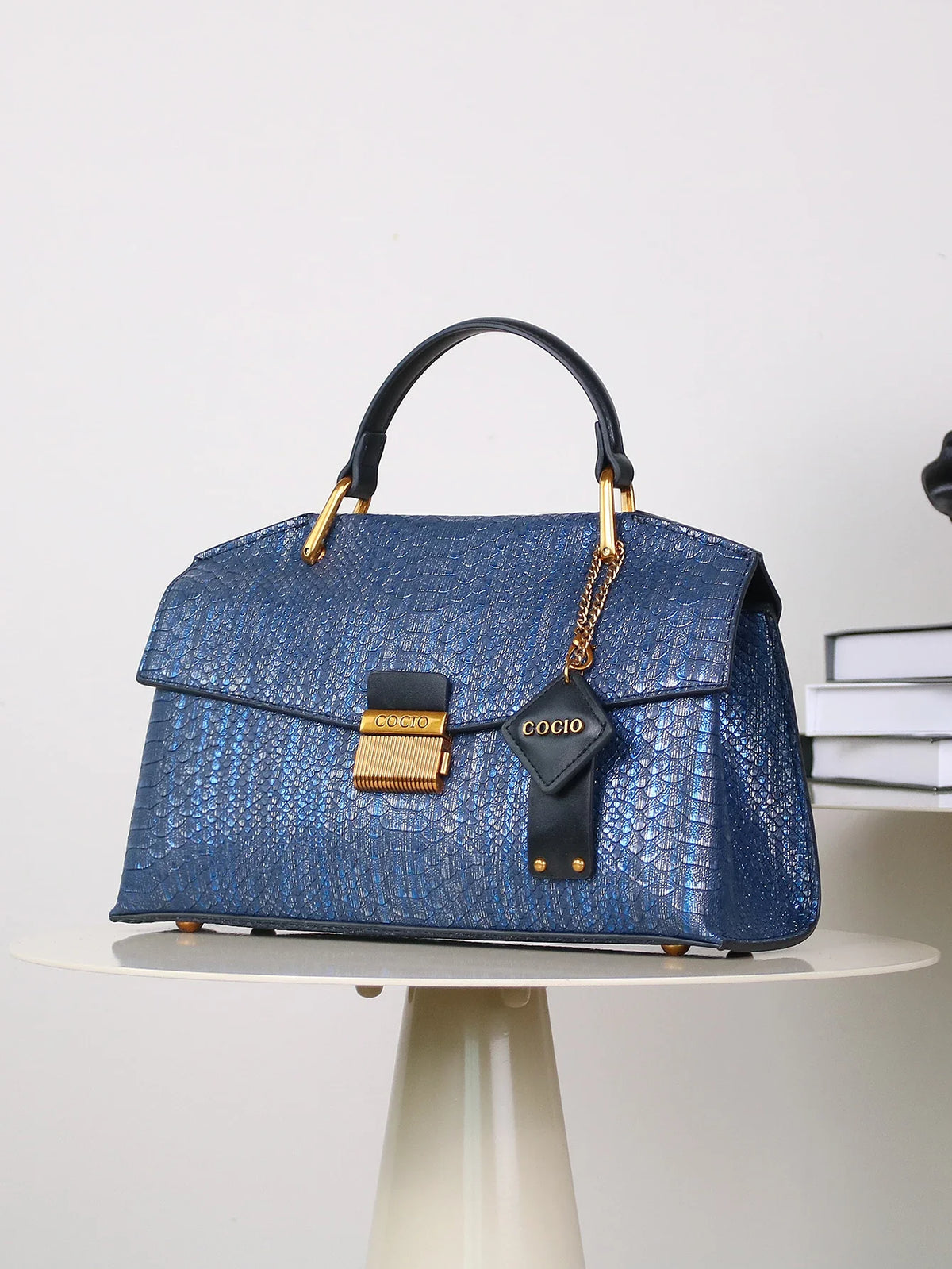 Textured Leather Shoulder Bag with Gold Hardware and Detachable Charm