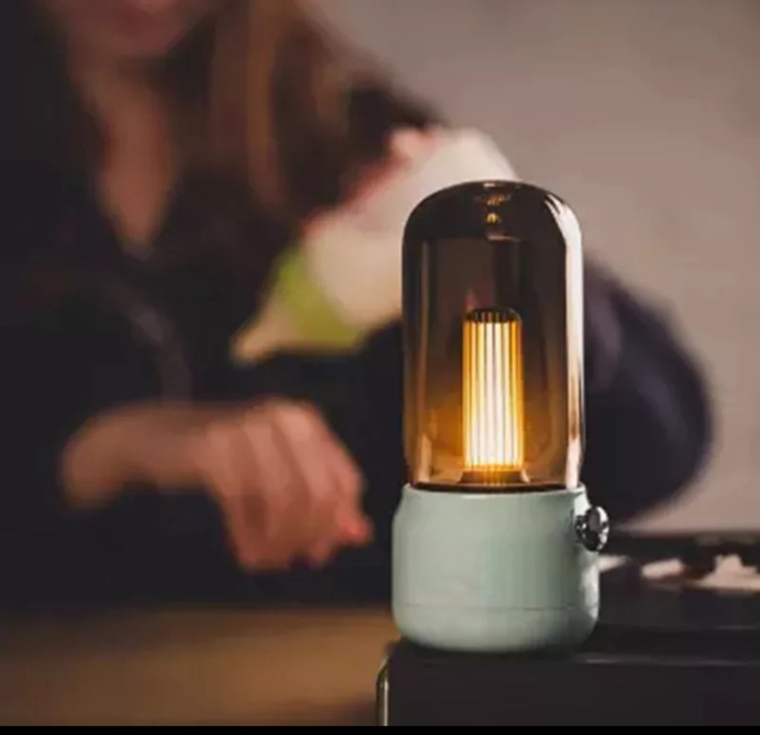 Vintage table lamp with candle style glow