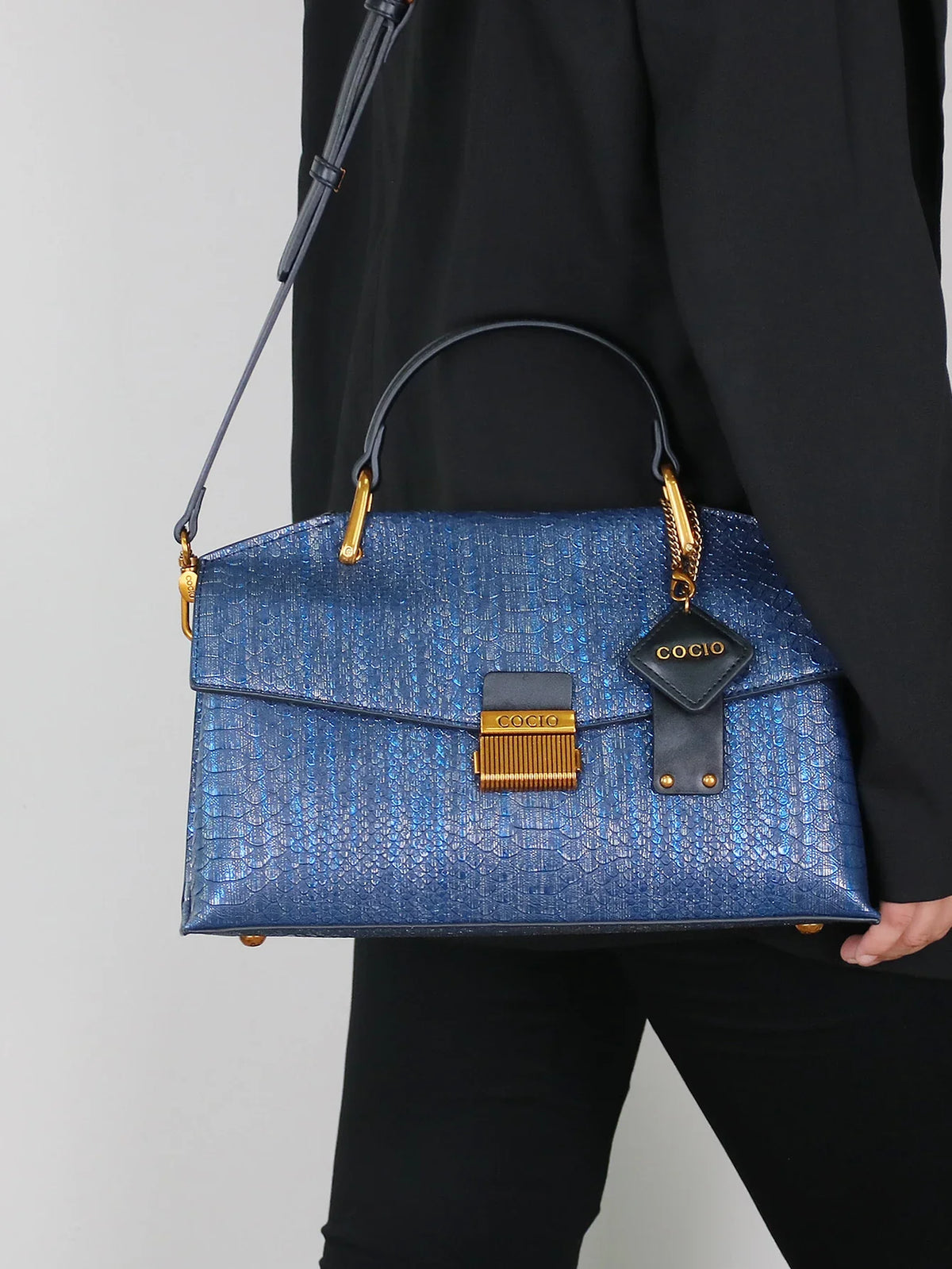 Textured Leather Shoulder Bag with Gold Hardware and Detachable Charm