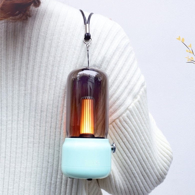 Portable vintage lamp carried on a strap